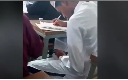 দাখিল পরীক্ষায় মোবাইল দেখে লেখার ভিডিও ভাইরাল, কেন্দ্র সচিব বহিষ্কার